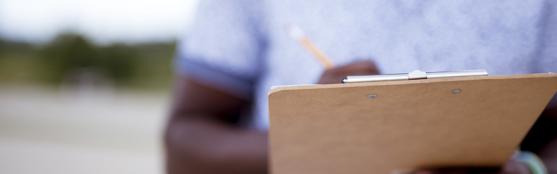 person holding a clipboard